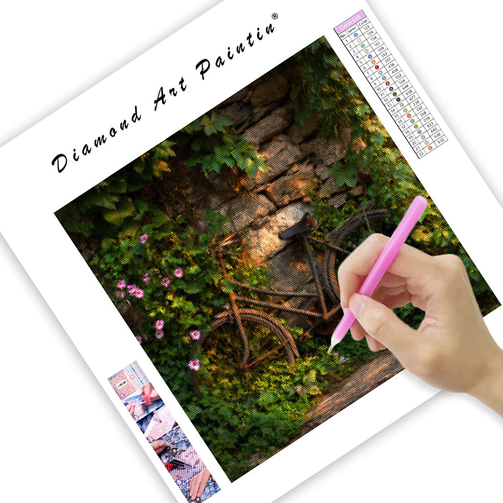 Cykel omfamnad av vinrankor - Diamantmålning