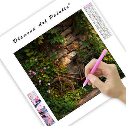 Cykel omfamnad av vinrankor - Diamantmålning