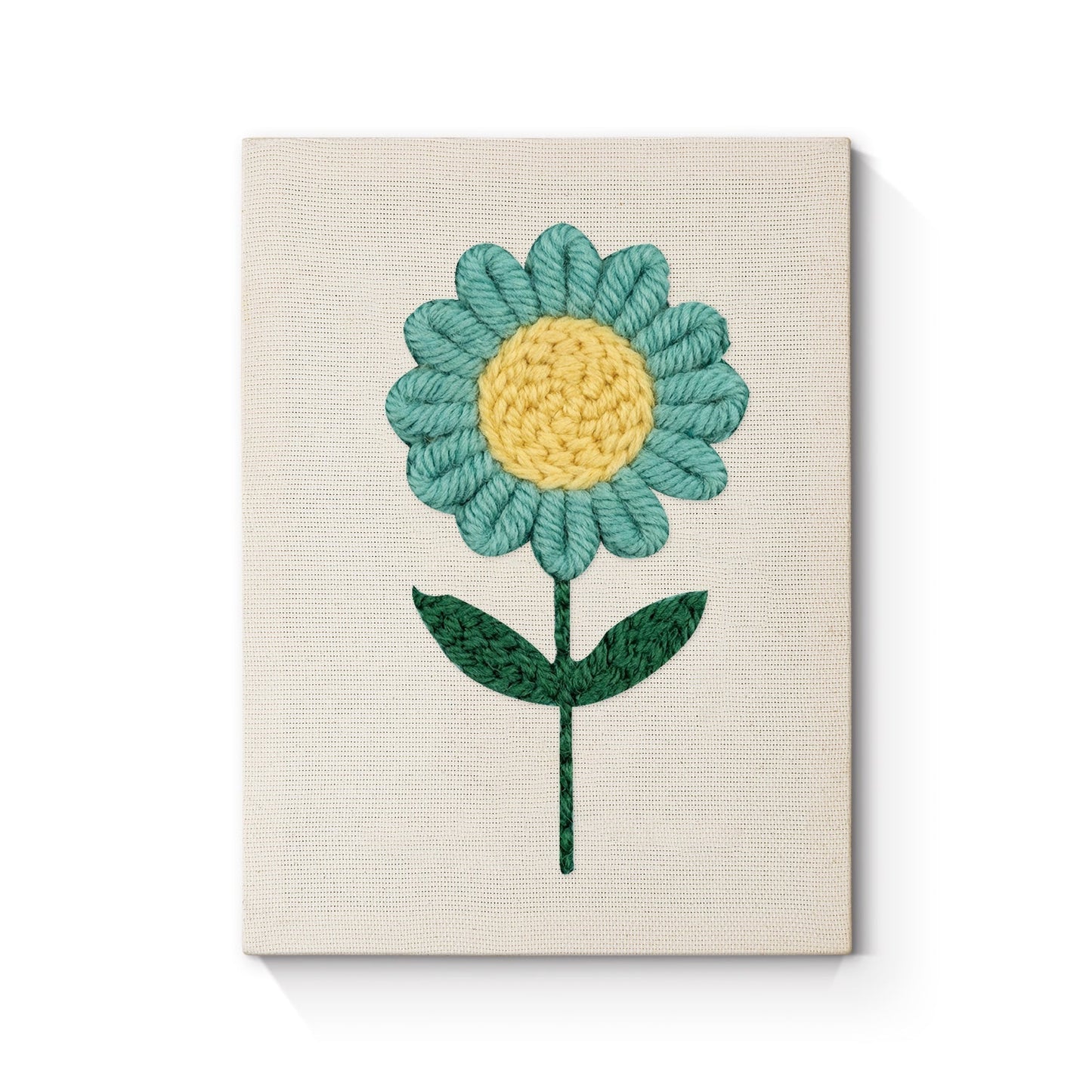 Blå blomma med gul mitt – Punch needle-broderi